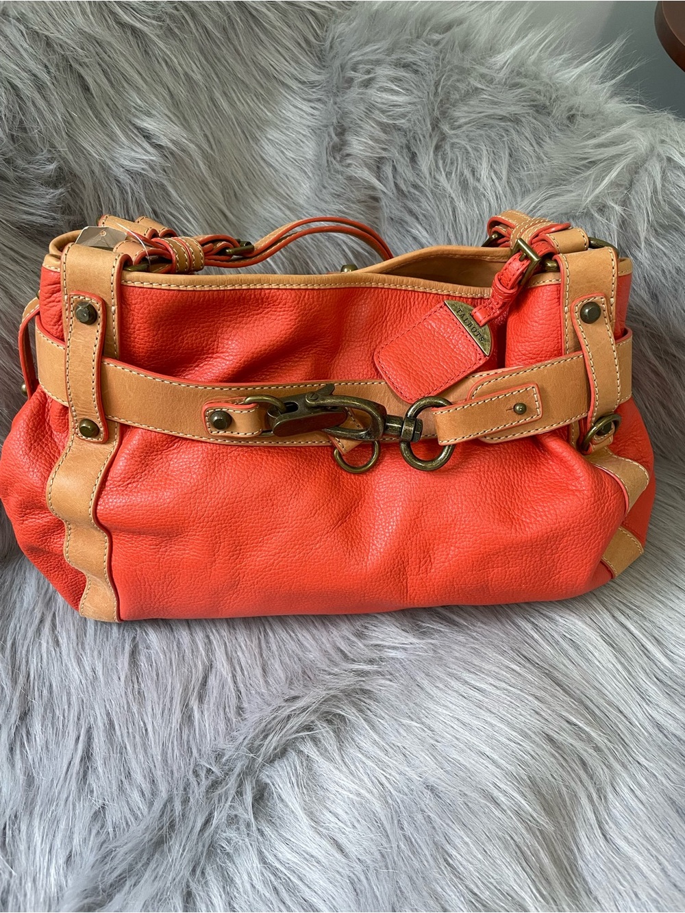 NWT Talbots orange leather purse with tan straps and metal buckles.
